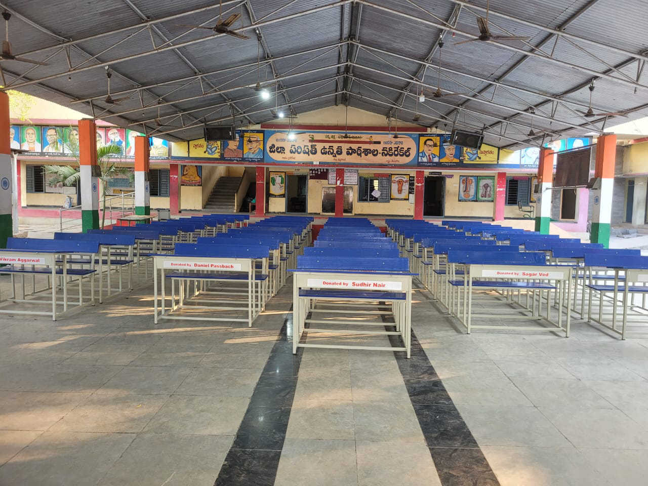 Benches at Nakrekal, each labelled with its donor